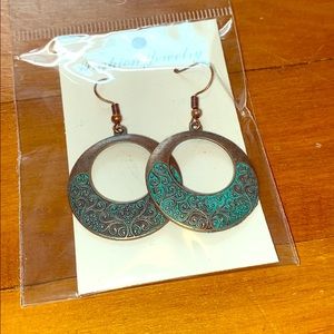 Brand new. Turquoise and brown hoop earrings.